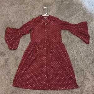 Girl's dark red dress with white dots